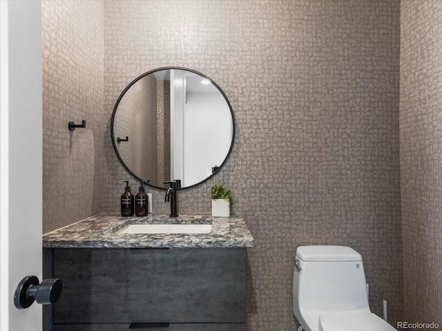 436 N Fuller Placer Rd, Breckenridge, CO 80424 - half bath with vanity, toilet, and tile walls
