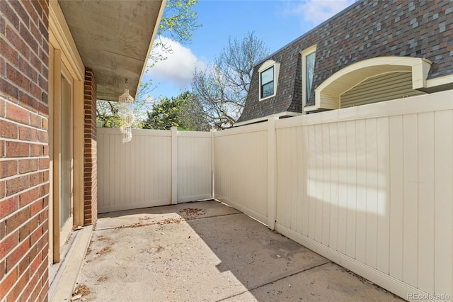 view of patio with fence
