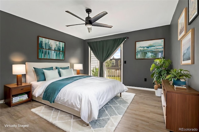 1370 S Idalia St Unit A, Aurora, CO 80017 - bedroom with access to outside, light wood-style flooring, baseboards, and a ceiling fan