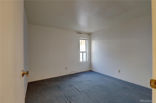 1050 S Monaco Pkwy Unit 88, Denver, CO 80224 - empty room with carpet flooring