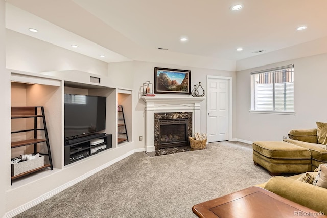 989 Graland Pl, Highlands Ranch, CO 80126 - carpeted living room with recessed lighting, baseboards, and a premium fireplace