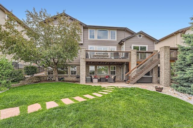 989 Graland Pl, Highlands Ranch, CO 80126 - rear view of property featuring an outdoor living space, a deck, a lawn, stairs, and a patio area