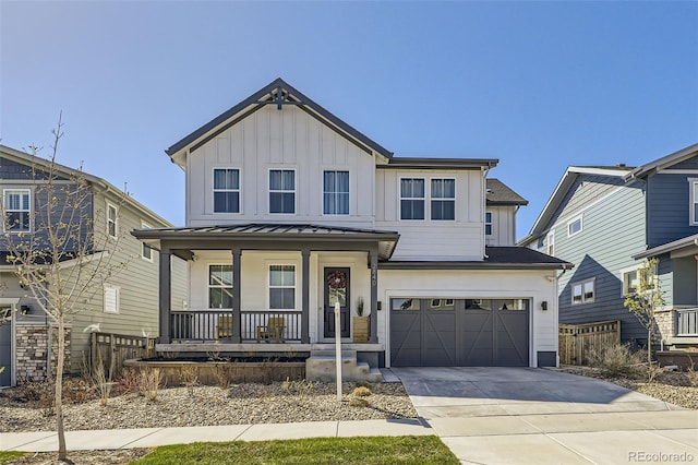 2840 E 102nd Pl, Thornton, CO 80229 - view of front of house featuring covered porch, an attached garage, driveway, and board and batten siding