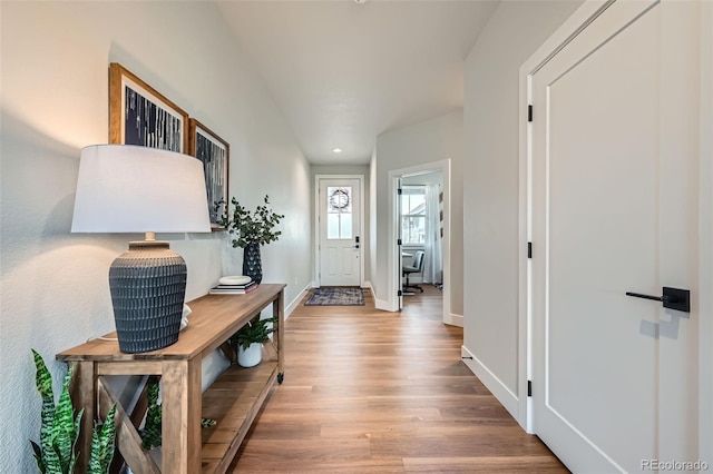 2840 E 102nd Pl, Thornton, CO 80229 - foyer entrance with wood finished floors, baseboards, and recessed lighting