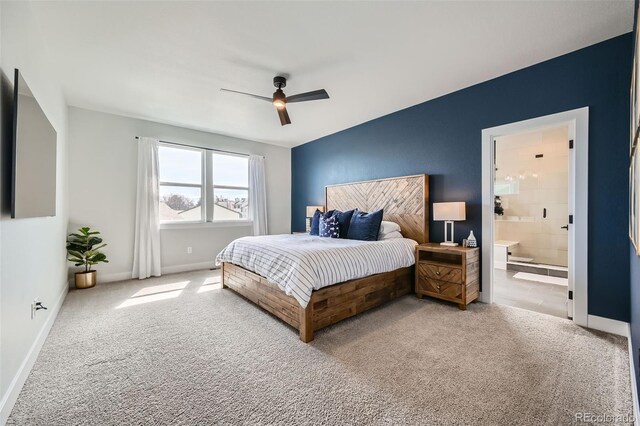2840 E 102nd Pl, Thornton, CO 80229 - carpeted bedroom featuring ensuite bathroom and a ceiling fan