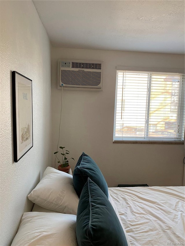 155 S Pennsylvania St Unit 209, Denver, CO 80209 - bedroom featuring a wall mounted air conditioner