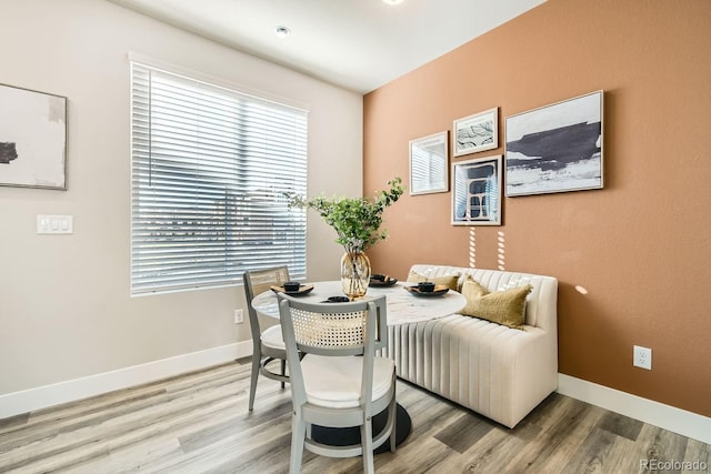 dining area featuring hardwood / wood-style flooring