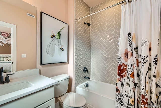 full bathroom with toilet, vanity, and shower / tub combo with curtain