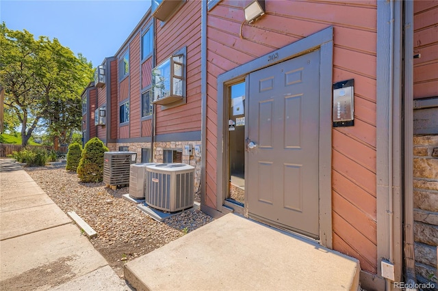 303 W Lehow Ave Unit 22, Englewood, CO 80110 - view of exterior entry with stone siding