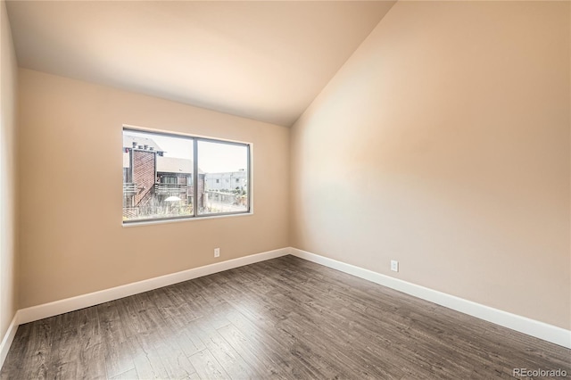 303 W Lehow Ave Unit 22, Englewood, CO 80110 - empty room with dark wood finished floors and vaulted ceiling