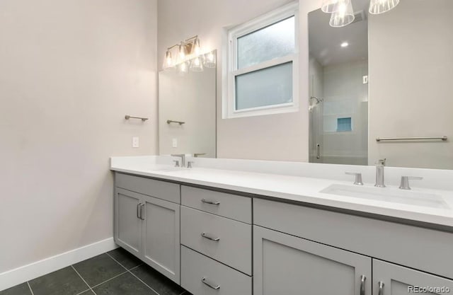 1744 Barefoot Dr, Windsor, CO 80550 - full bathroom with double vanity, a shower, and tile patterned flooring