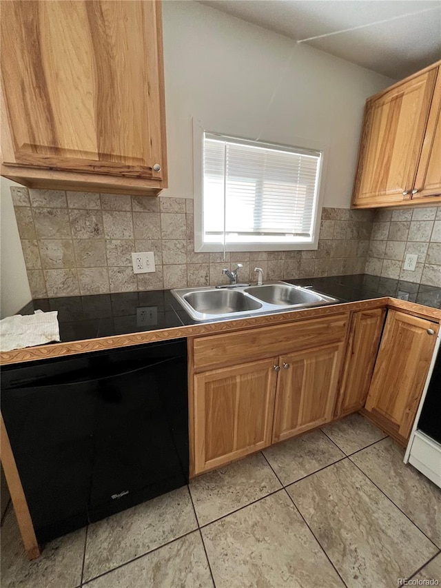 kitchen with dishwasher, tasteful backsplash, sink, and light tile patterned floors