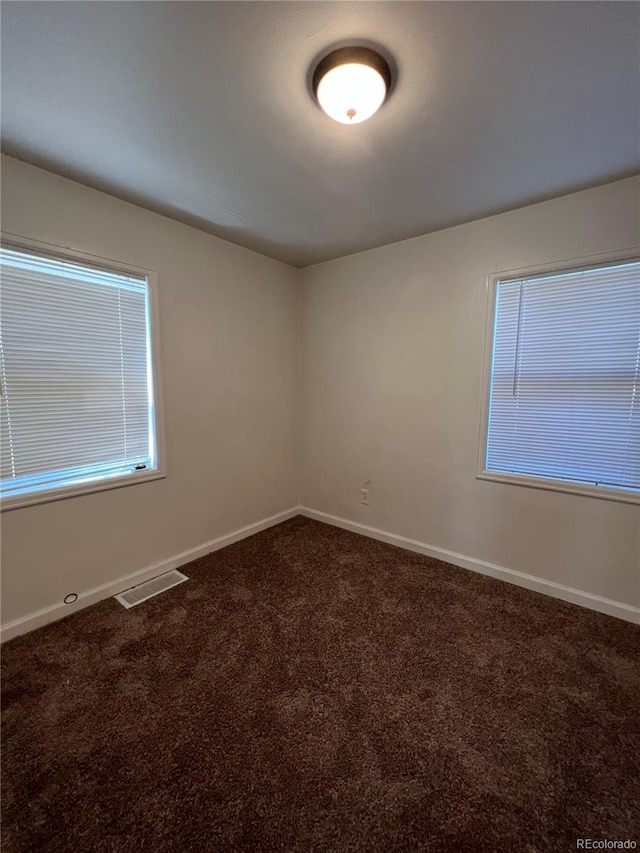 view of carpeted spare room