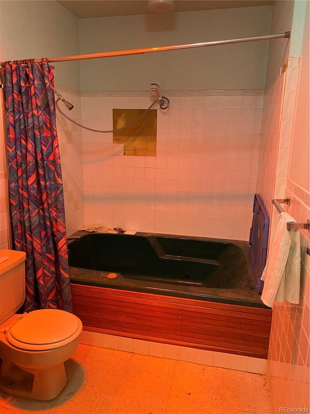 bathroom with toilet and shower / bath combo with shower curtain