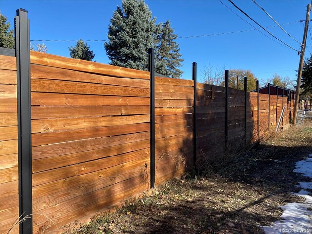 view of gate featuring fence