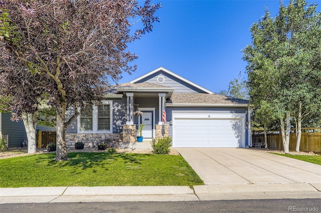 12 Apache Plume St, Brighton, CO 80601 - ranch-style home with an attached garage, driveway, and stone siding