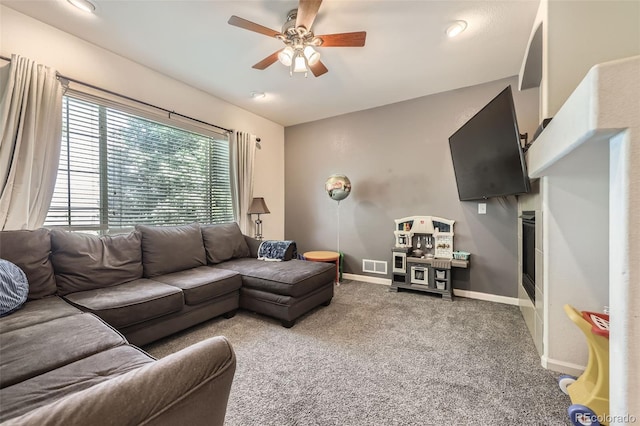 12 Apache Plume St, Brighton, CO 80601 - living room with carpet flooring and a ceiling fan