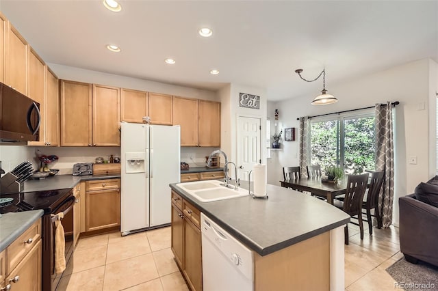 12 Apache Plume St, Brighton, CO 80601 - kitchen featuring white appliances, light tile patterned floors, recessed lighting, and dark countertops