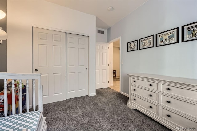 12 Apache Plume St, Brighton, CO 80601 - unfurnished bedroom featuring dark carpet and a closet