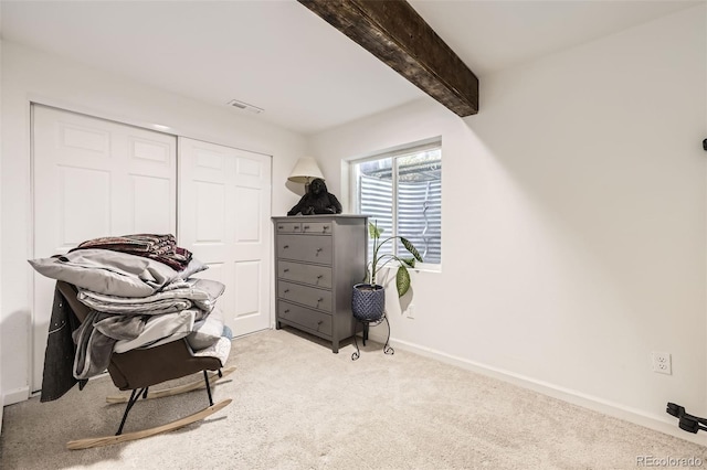 12 Apache Plume St, Brighton, CO 80601 - living area featuring carpet flooring and beamed ceiling