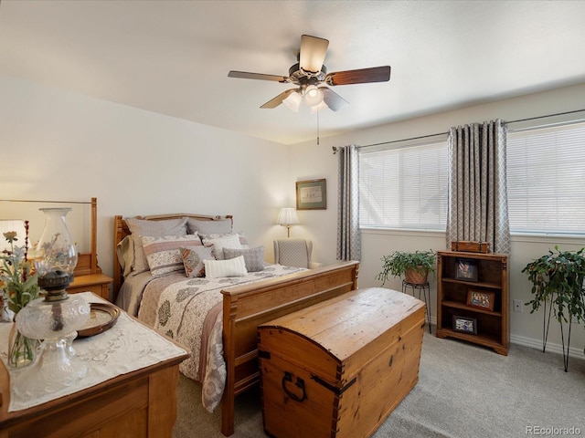 5006 S Nelson St Unit B, Littleton, CO 80127 - bedroom featuring multiple windows, light carpet, and a ceiling fan