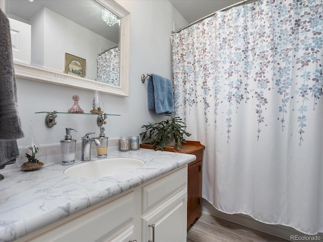 5006 S Nelson St Unit B, Littleton, CO 80127 - full bath with vanity and wood finished floors