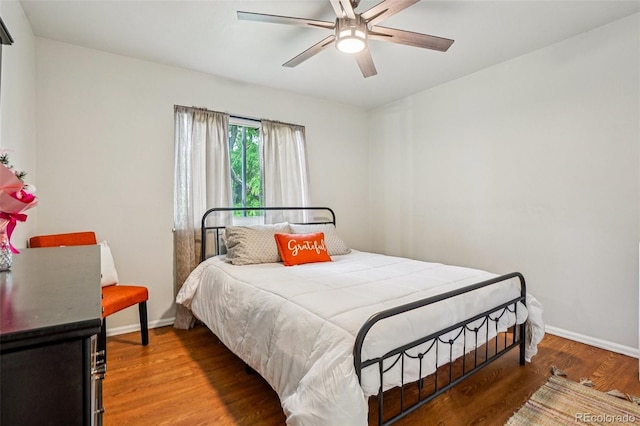 1733 S Nucla St, Aurora, CO 80017 - bedroom featuring wood finished floors and ceiling fan