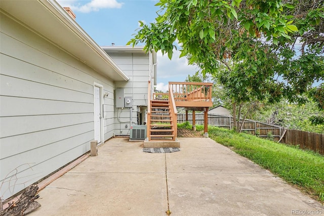 1733 S Nucla St, Aurora, CO 80017 - fenced backyard with stairs, a patio area, and a wooden deck