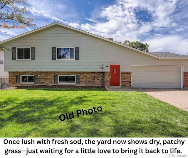 1733 S Nucla St, Aurora, CO 80017 - split level home featuring a garage, brick siding, a front yard, and driveway