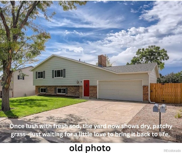 1733 S Nucla St, Aurora, CO 80017 - tri-level home featuring brick siding, a garage, concrete driveway, and a chimney