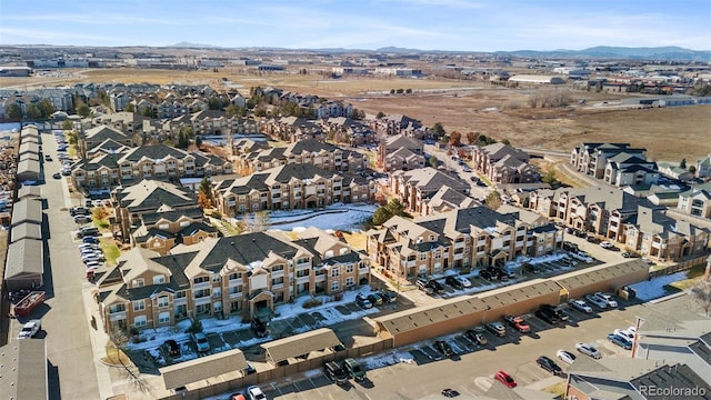 drone / aerial view featuring a mountain view