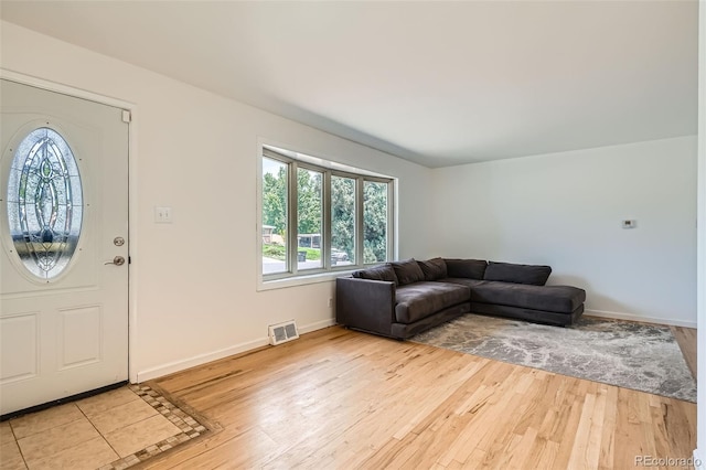 2692 S Osceola St, Denver, CO 80219 - entryway featuring hardwood / wood-style flooring and baseboards