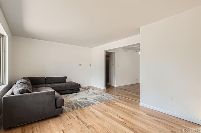 2692 S Osceola St, Denver, CO 80219 - living area with wood finished floors and ceiling fan