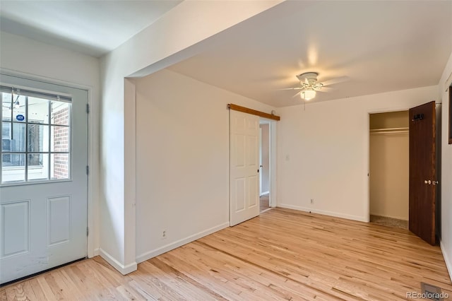 2692 S Osceola St, Denver, CO 80219 - entrance foyer with light wood-style floors and ceiling fan