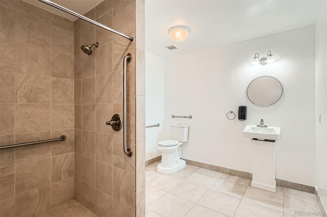2692 S Osceola St, Denver, CO 80219 - bathroom featuring tile patterned floors and a tile shower