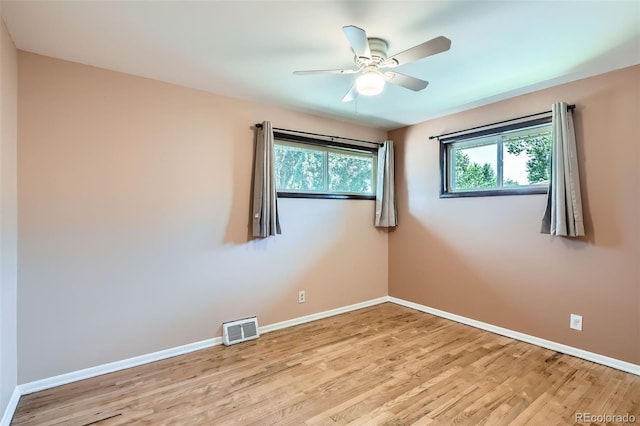 2692 S Osceola St, Denver, CO 80219 - spare room with wood finished floors and a ceiling fan