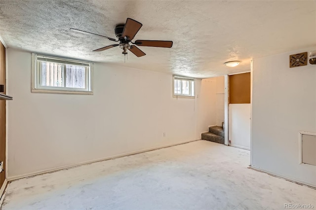 2692 S Osceola St, Denver, CO 80219 - basement featuring stairway, a textured ceiling, and ceiling fan