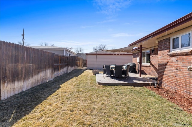 view of yard with a fenced backyard and a patio