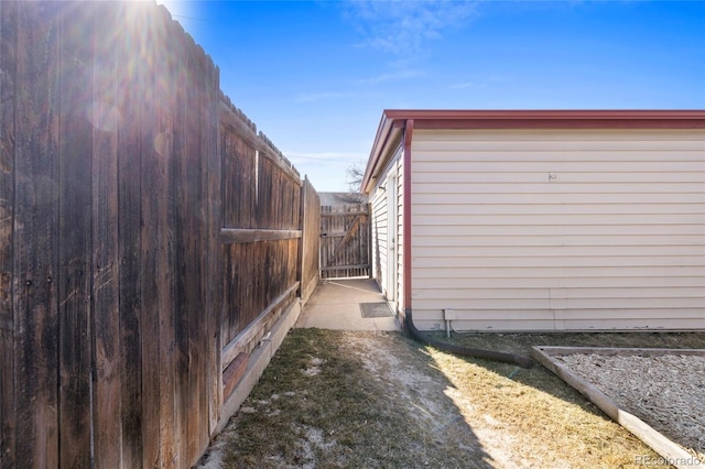 view of property exterior featuring fence