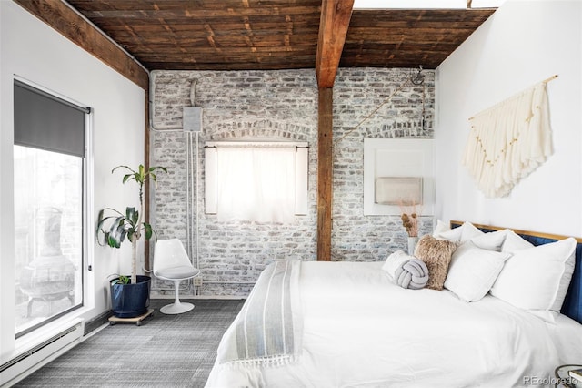 bedroom featuring brick wall, baseboard heating, wooden ceiling, and beamed ceiling