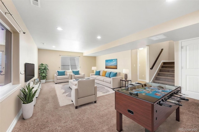 recreation room featuring baseboards, light carpet, recessed lighting, and visible vents