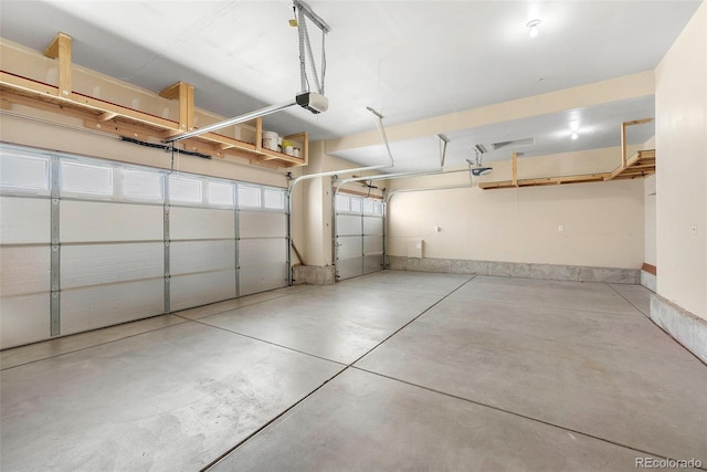 garage featuring a garage door opener