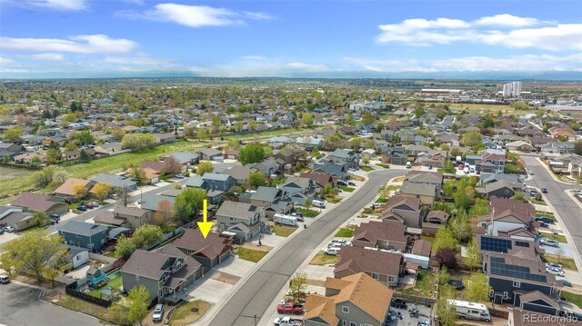birds eye view of property with a residential view