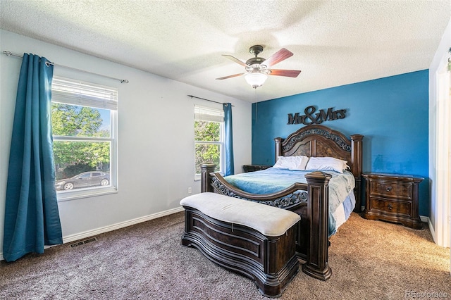 19523 E Buchanan Pl, Aurora, CO 80011 - bedroom featuring carpet, a textured ceiling, a ceiling fan, and baseboards