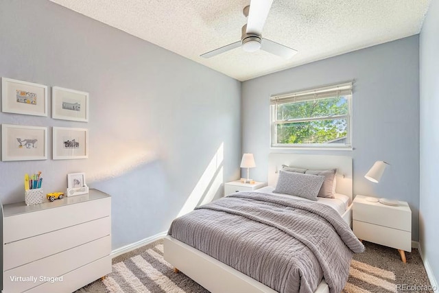 19523 E Buchanan Pl, Aurora, CO 80011 - bedroom featuring a textured ceiling, baseboards, carpet floors, and ceiling fan