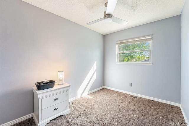 19523 E Buchanan Pl, Aurora, CO 80011 - unfurnished bedroom with a textured ceiling, light carpet, baseboards, and a ceiling fan