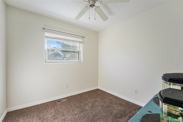 19523 E Buchanan Pl, Aurora, CO 80011 - unfurnished office featuring carpet floors, ceiling fan, and baseboards