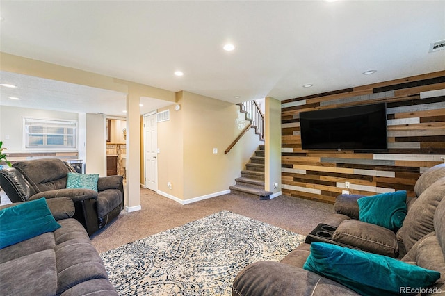 19523 E Buchanan Pl, Aurora, CO 80011 - living room with carpet flooring, wooden walls, baseboards, stairway, and recessed lighting