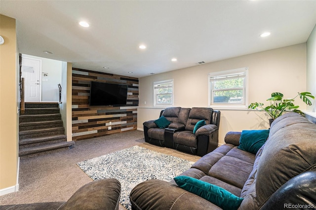 19523 E Buchanan Pl, Aurora, CO 80011 - carpeted living room with recessed lighting, baseboards, stairs, and wooden walls