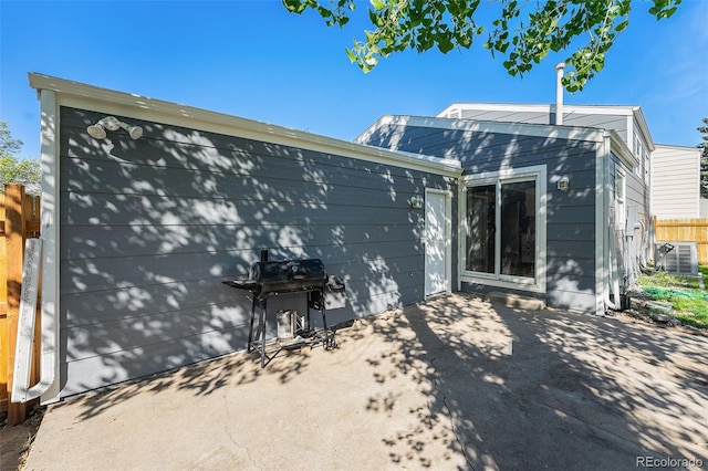 19523 E Buchanan Pl, Aurora, CO 80011 - rear view of house featuring a patio and central air condition unit